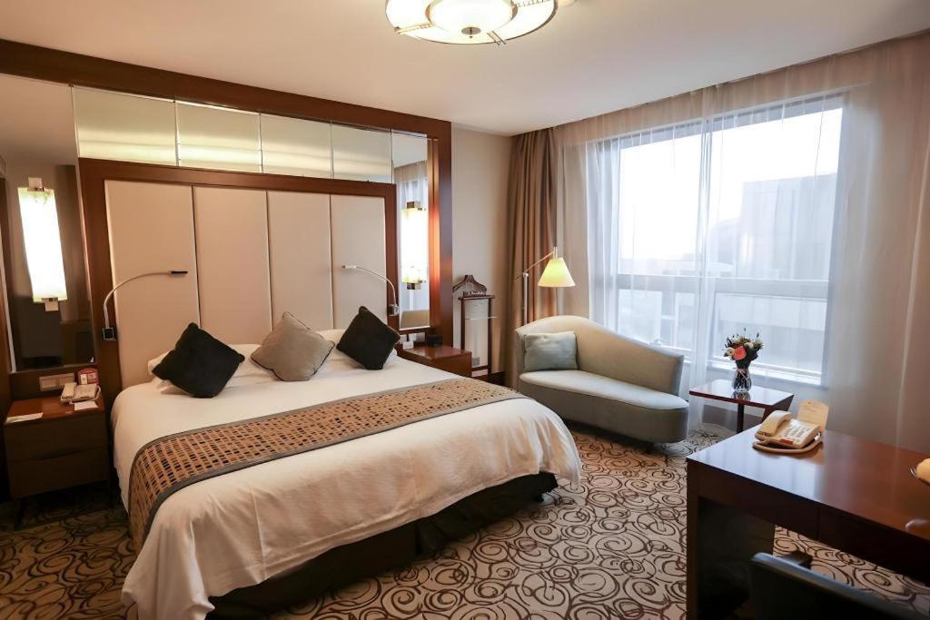 Grand Soluxe Zhongyou Hotel Шанхай Экстерьер фото