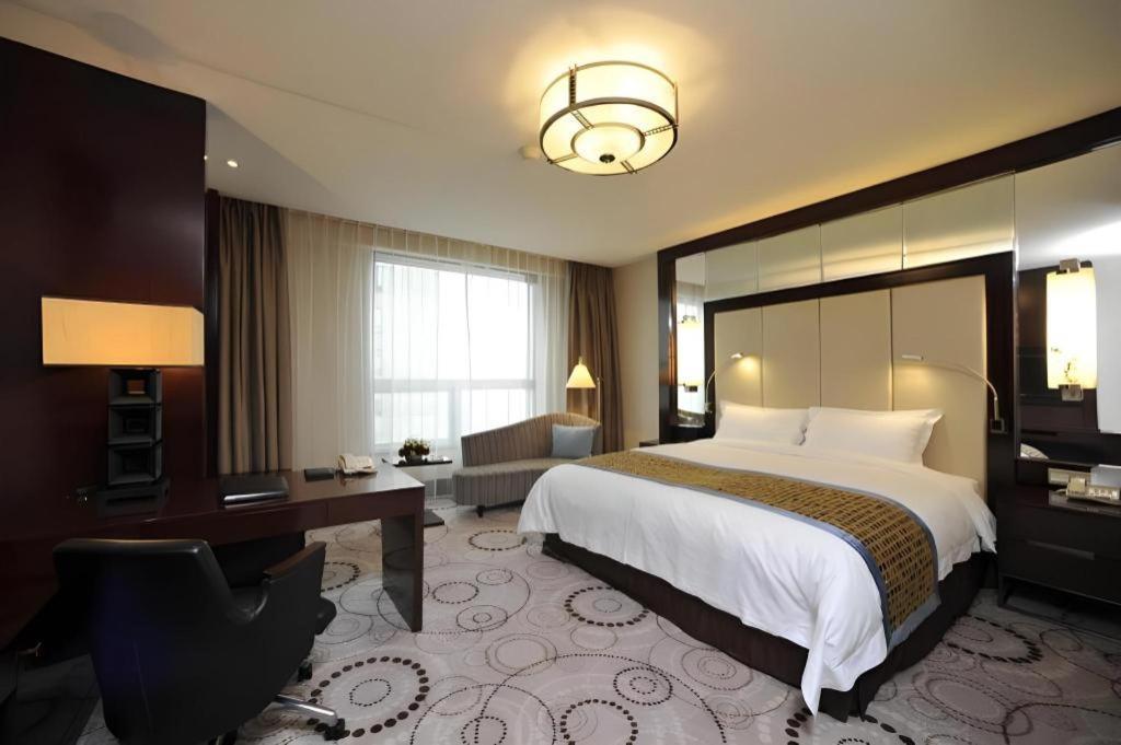 Grand Soluxe Zhongyou Hotel Шанхай Экстерьер фото